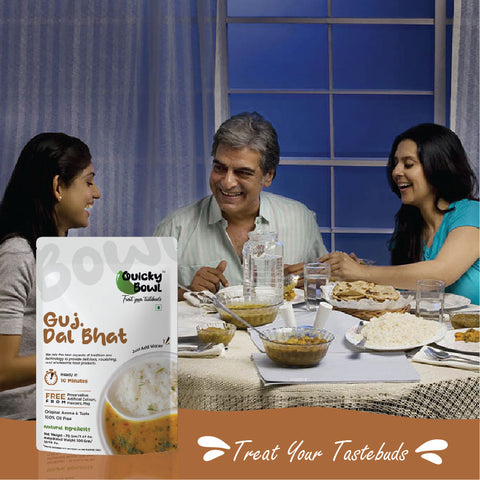 A family enjoying Guj dal bhat for dinner A family enjoying Guj dal bhat for dinner