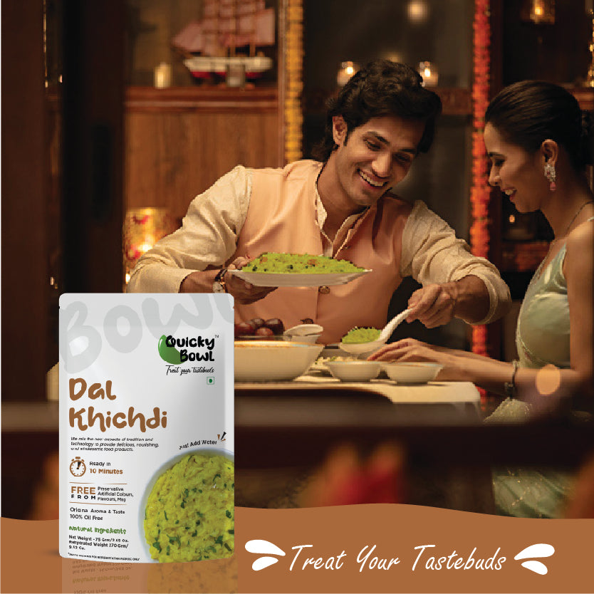 A couple enjoying Dal Khichdi A couple enjoying Dal Khichdi