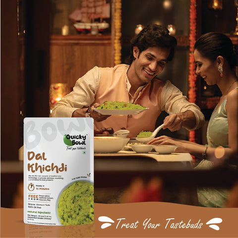 A couple enjoying Dal Khichdi A couple enjoying Dal Khichdi